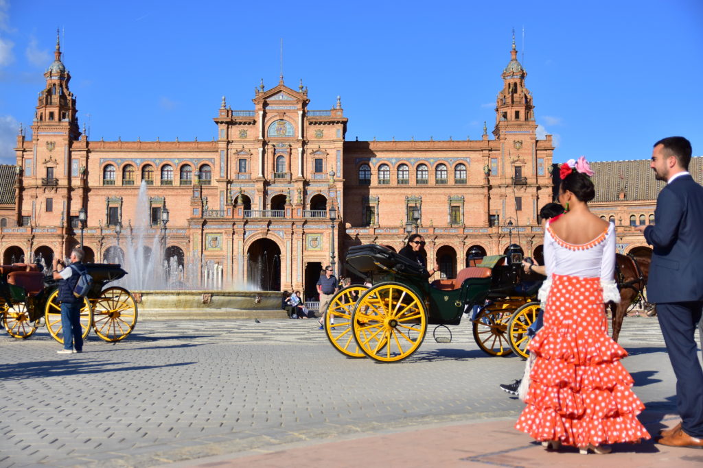 Spanish couple in traditional clothes, authentic experience in seville